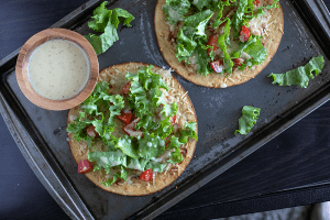 Caesar Salad Pizza on baking sheet