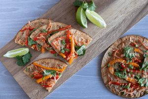 Veggie Thai Pizza on table