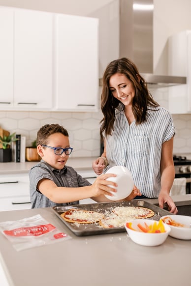 Mom and Son making pizza 