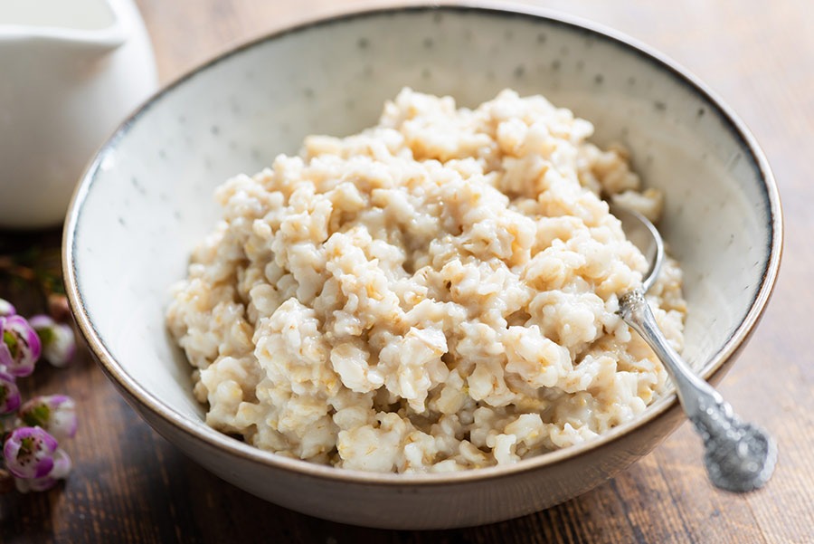 Dish of Carrot Cake Oatmeal with spoon