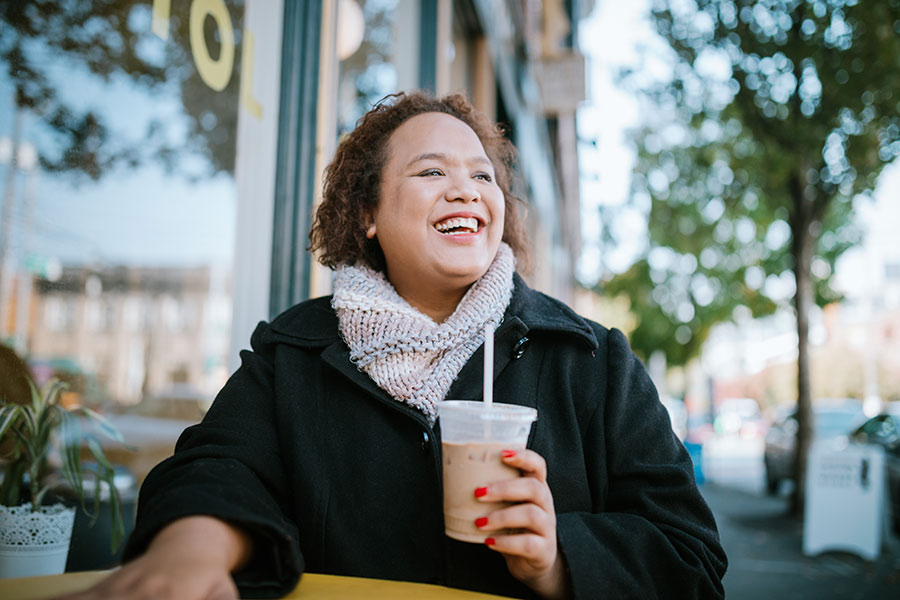 lady enjoying iced coffee